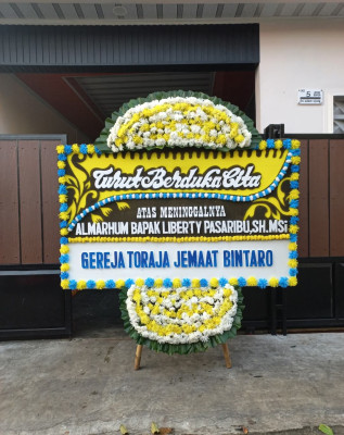 Papan Bunga Duka di Purwodinatan